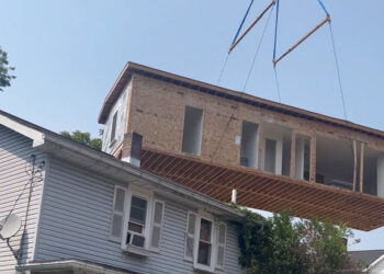 Crane lift intensifies tensions over a Land Bank project in Kingston